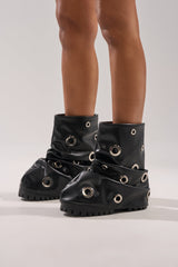 AKIRA GOLD FABLE BLACK GROMMET EMBELLISHED FLAT BOOTIE