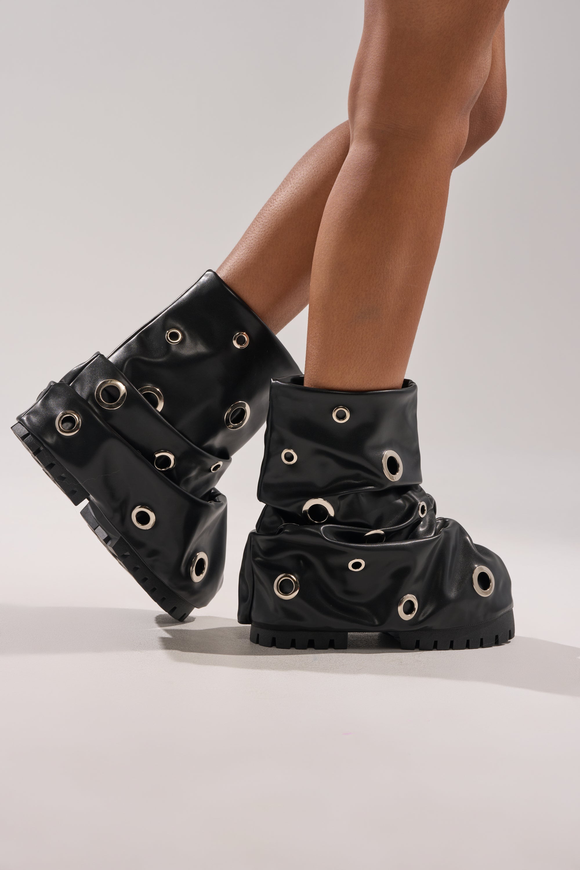 AKIRA GOLD FABLE BLACK GROMMET EMBELLISHED FLAT BOOTIE