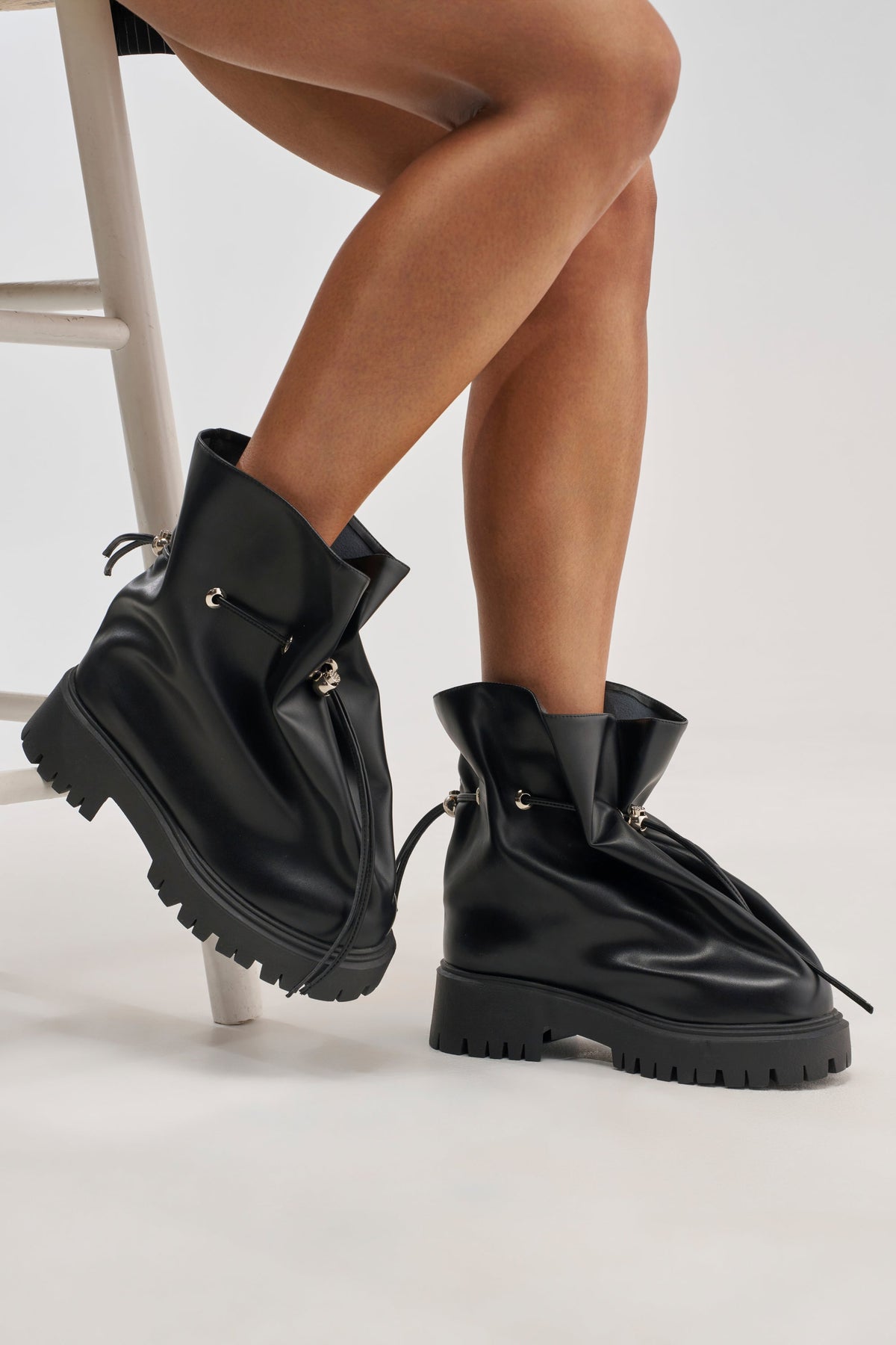 AKIRA GOLD IRON BLACK FLAT BOOTIE